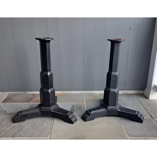 Art Deco Cast Iron Bases a pair. They are 28" high and the legs are 21' apart. The legs protrude approximately 10" from...
