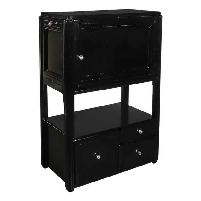 Art Deco Machine Age Bar Cabinet in Black Lacquer With Swivel and Drop Doors For Sale