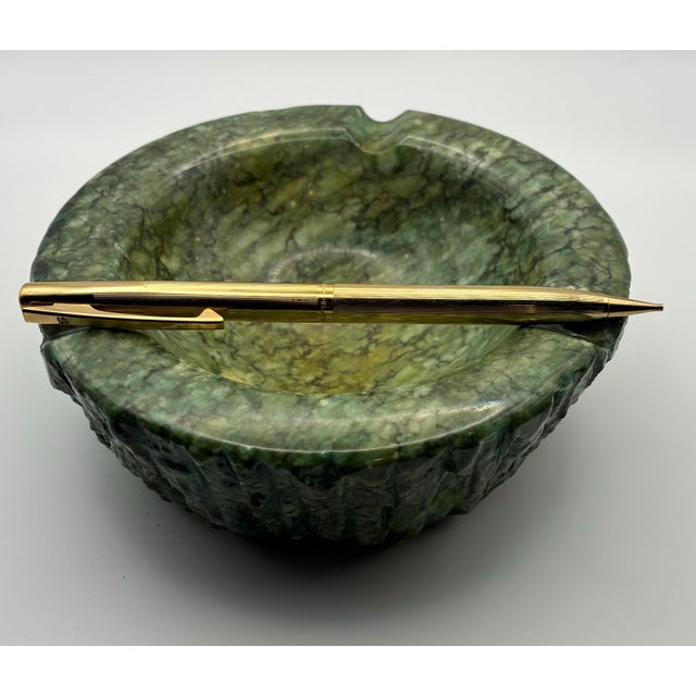 Vintage Italian carved stone ashtray or decorative catchall crafted from richly veined green marble. This sculptural piece...