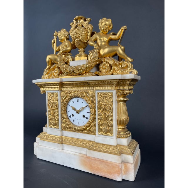 A Museum Quality Ormolu Mounted White Marble Clock by Pierre-Philippe Thomire (1751-1843) This clock dates back to the...