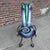 Unique postmodern chair by Joan Irving, featuring colorful geometric art glass panels with bold spiral designs and a...