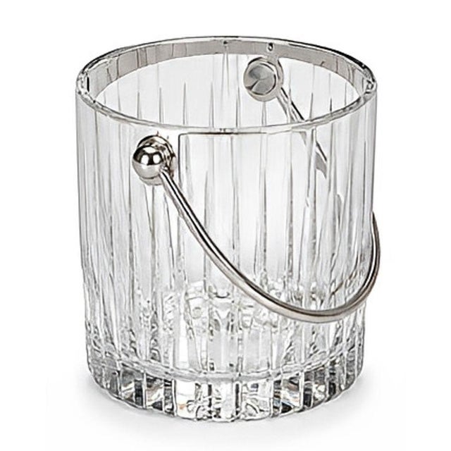 Elegant Baccarat crystal barware set comprising a crystal ice bucket, six highball glasses, and six double old-fashioned...