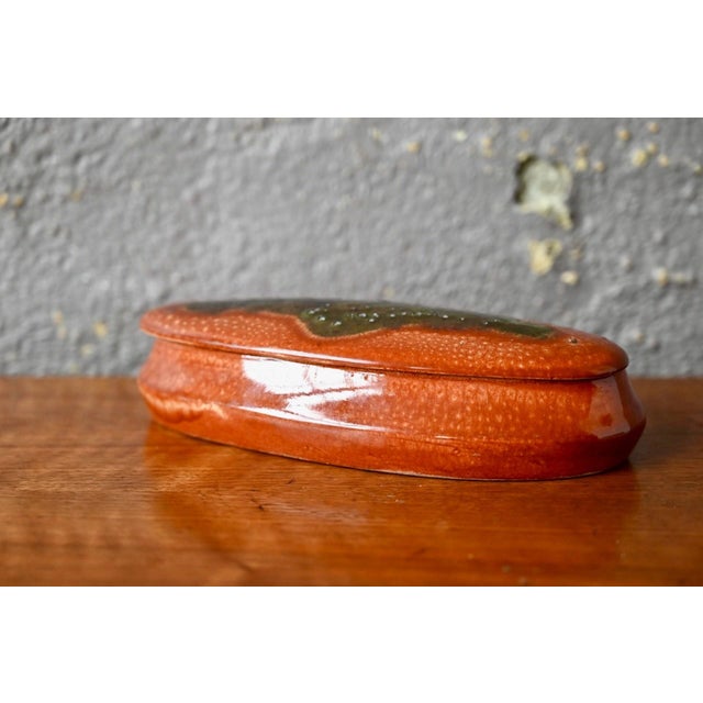 Simply captivating, this small glazed ceramic jewelry box showcases the meticulous and sensitive work of the great ceramic...