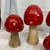 Offered here is a set of different sized folk art mushrooms. Hand carved and hand painted.