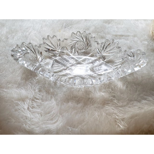 Small but beautiful crystal dish. Suitable in all rooms to be used as vanity tray, food items or just decoration.