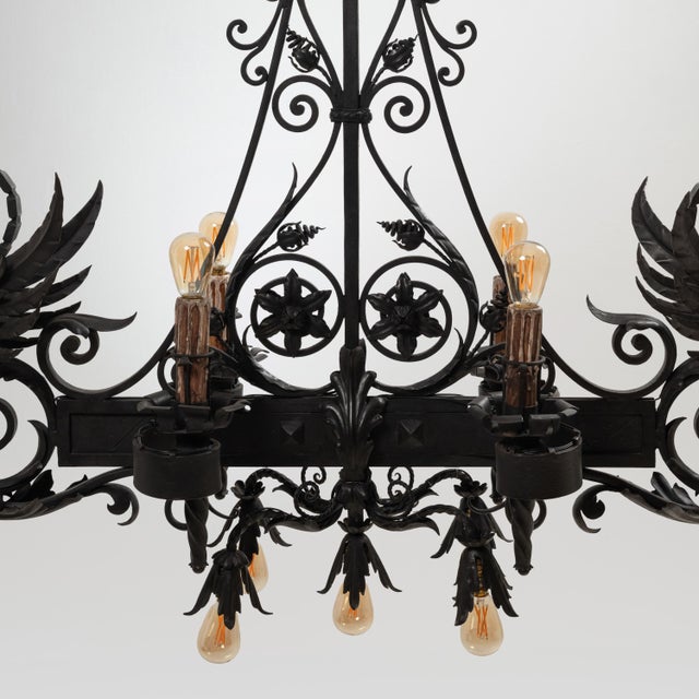 Chandelier in Black Wrought Iron by Carlo Rizzarda, 1920s, in Flawless conditions. Designed 1920 to 1949 This piece has an...