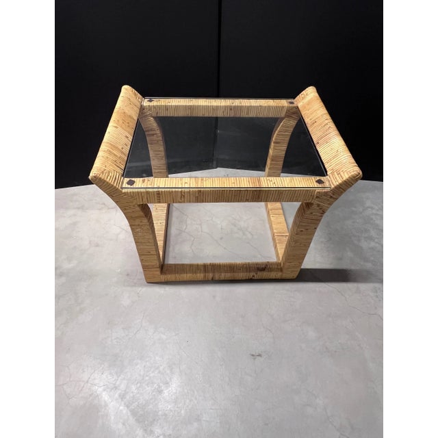 Pair of bamboo wrapped over hardwood frame side tables with glass tops in Bielecky Brothers style. In excellent as found...