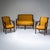 Empire seating suite in mahogany, consisting of a two-seat sofa and four armchairs (two not shown). The frames display a...