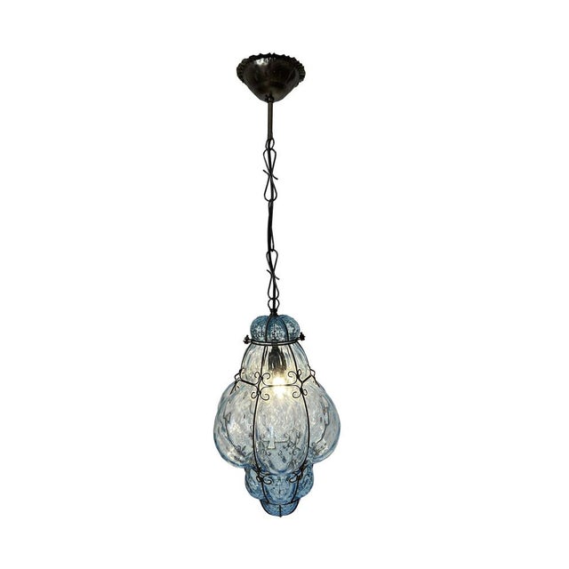 Precious Venetian Lantern. The glass is is in excellent condition. The hight indicated in the dimensions section includes...