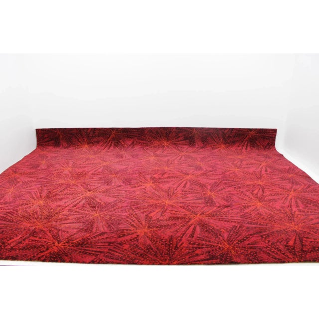 This colorful rug was designed by A. Ambrossová and made in former Czechoslovakia in 1967. It is in original condition.