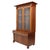 An impressive antique American Empire step back cupboard, crafted from rich mahogany around 1840, features a distinctive...