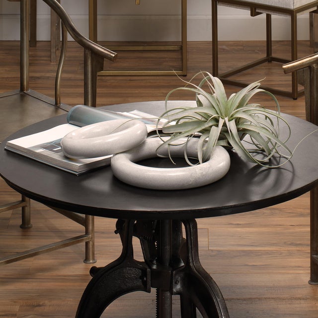 The White Marble Ring is a clean and smooth piece that truly stands out in any space. With its sturdy iron base, round...