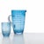 Collection for the table in clear colored glass. It includes tumblers for water and soft drinks, wine glasses, flute...