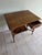 This is an exquisite Art Nouveau oak table with all the curves and design elements one would expect from the period. This...