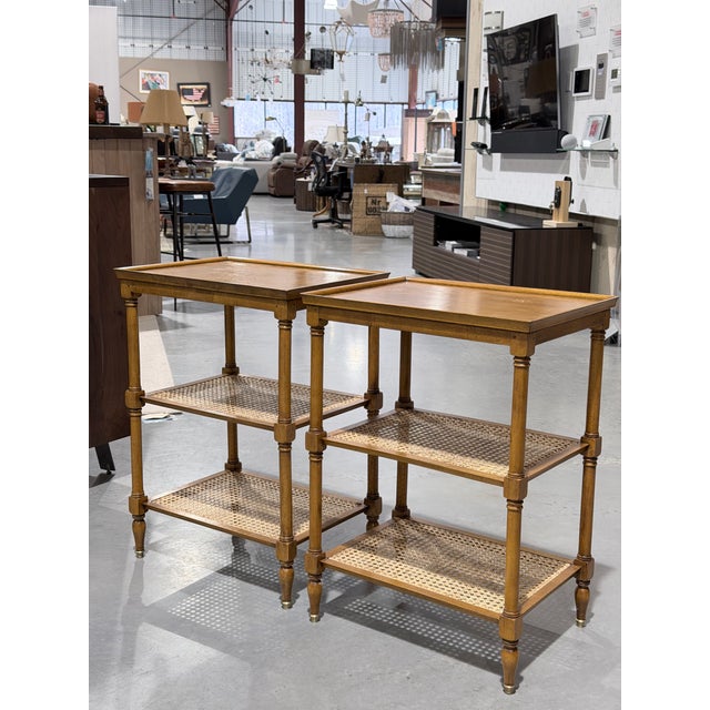 This is a beautifully crafted pair of Pierre Deux French Provincial end tables finished in warm honey toned wood with...