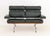 Charles and Ray Eames for Herman Miller Two-Seat Sofa, with green leather upholstery on walnut frame above aluminum eight...