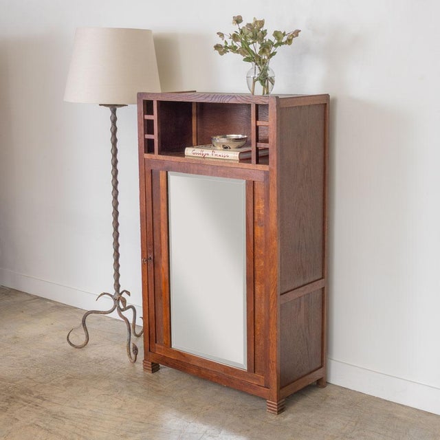Beautiful arts and crafts style wood bar cabinet from France, 1910s. Lovely open shelf with geometric detail on upper...