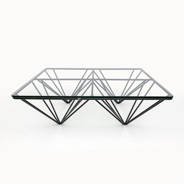 This vintage coffee table, the Alanda model, was designed by Paolo Piva for B & B Italia. The frame is made of black...
