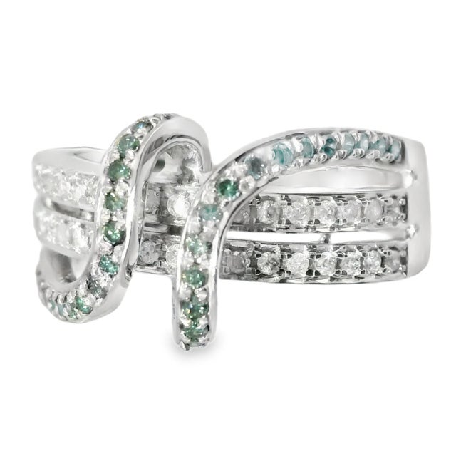 Add elegance and color to your collection with this 14K white gold ring, featuring 32 blue diamonds and 34 white diamonds...
