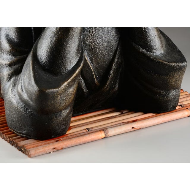 Bring warmth and lighthearted serenity into your space with this Laughing Baby Buddha Statue. Measuring 21" wide and 14"...