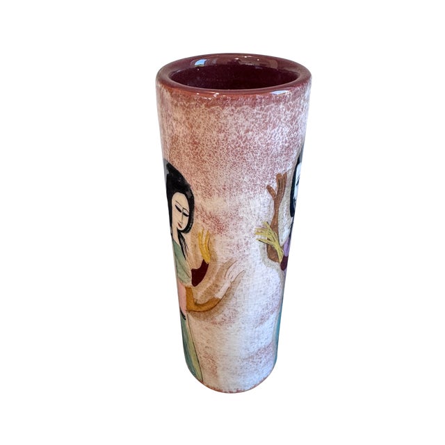 A beautifully expressive vintage studio pottery vase by Poila Fillin, featuring a hand-painted figural portrait with an...