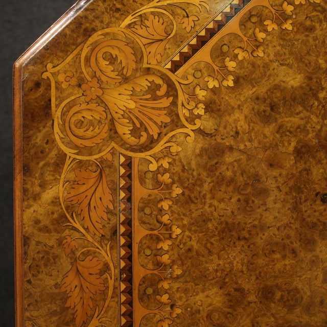 English living room table from the first half of the 20th century. Octagonal shaped furniture with a richly inlaid top...
