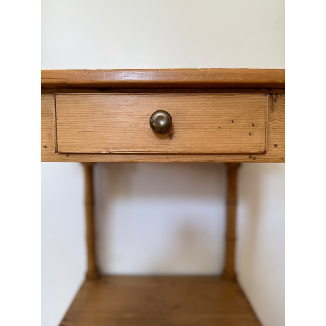 Gorgeous handmade 19th century European pine table (likely English or Irish) with a lovely natural color that strikes the...