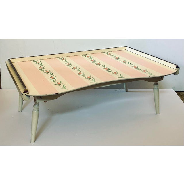 Delightful bed tray that is so handy. Turned with the curved edge facing you it wraps your body and makes eating on a flat...