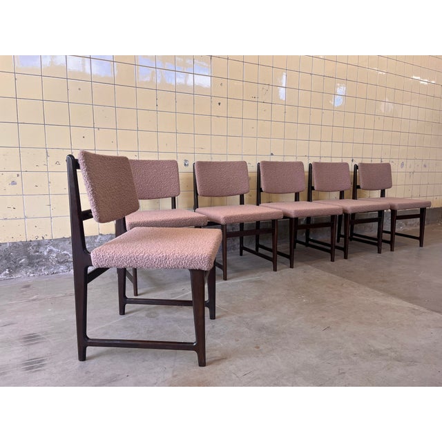 This beautiful set of six Belgian dining chairs features elegant dark brown frames that pair perfectly with the warm brown...