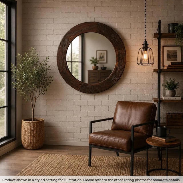 Dimensions: 47" W x 47" D x 2" H This unique mirror is crafted using a vintage teak wood wheel as a frame. The spokes were...