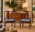 Elegant pair of vintage Henredon Hollywood Regency Chinoiserie dining armchairs, featuring beautifully sculpted mahogany...
