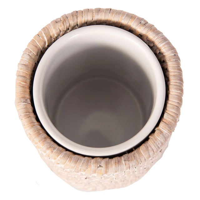 We are introducing our charming Rattan and Ceramic Tumbler, a multifunctional treasure for any room in your home! It's...