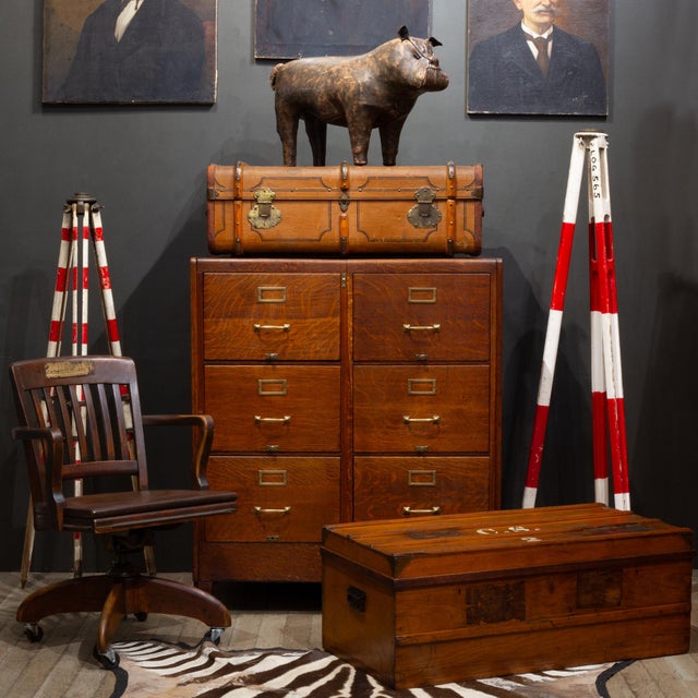 ABOUT An early 20th-century flat-top cabin steamer trunk crafted by the renowned F. Waldbaur Koffer & Lederwarenfabrik of...
