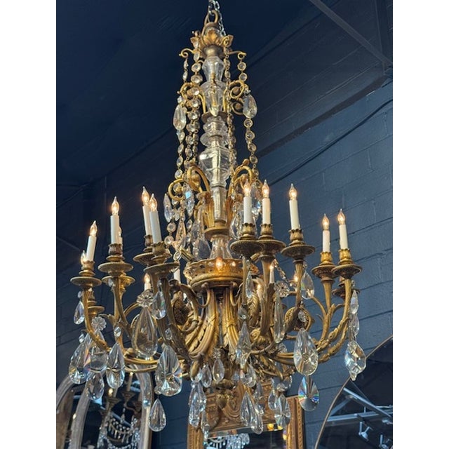 Large and Exceptional 19th century French Louis XVI gilt bronze and crystal chandelier. These chandeliers were designed...