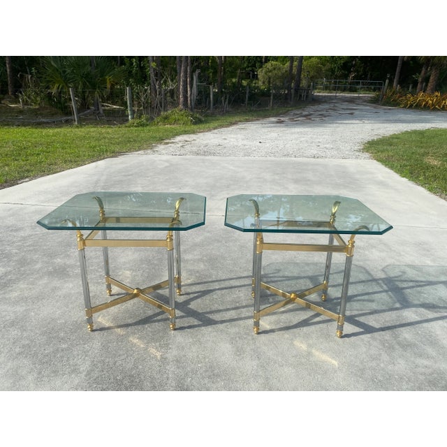 Hollywood Regency Chrome and Brass Side Tables Styled After Maison Jansen- a Pair. These tables feature chrome and brass...