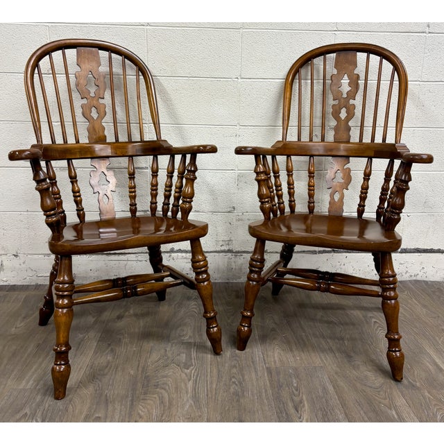 This is a gorgeous pair of vintage solid wood Windsor-style arm chairs by Barnard & Simonds Co. of Grand Rapids, Michigan....