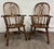 This is a gorgeous pair of vintage solid wood Windsor-style arm chairs by Barnard & Simonds Co. of Grand Rapids, Michigan....