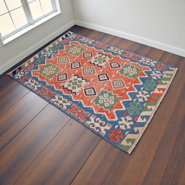 Super fine, ultra-lightweight 4x5 Turkish village kilim from Oushak, ideal for adding joyful geometric character and...