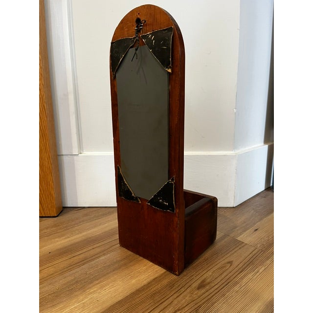 Primitive wall box planter with curved mirror.