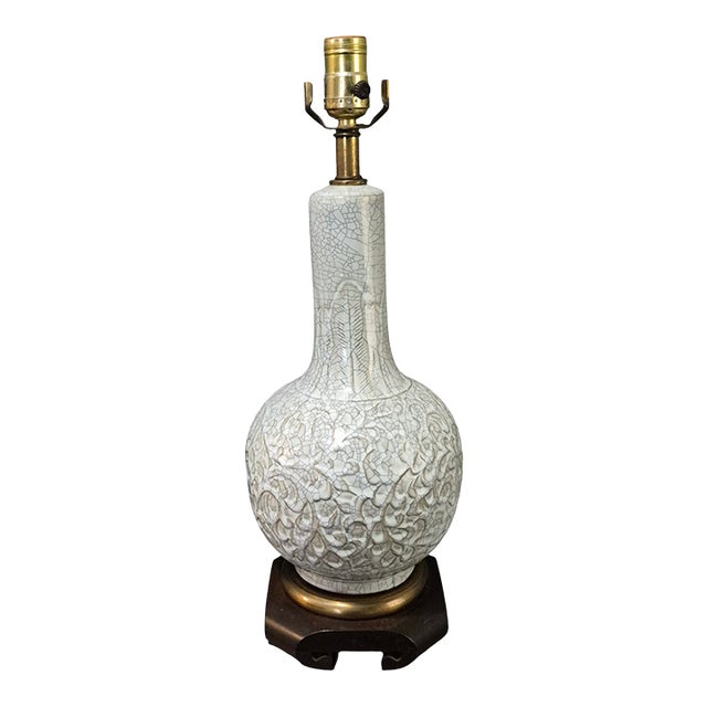 Late 20th Century Asian Pale Celadon Green Color Crackled Ceramic Embossed Design Table Lamp For Sale