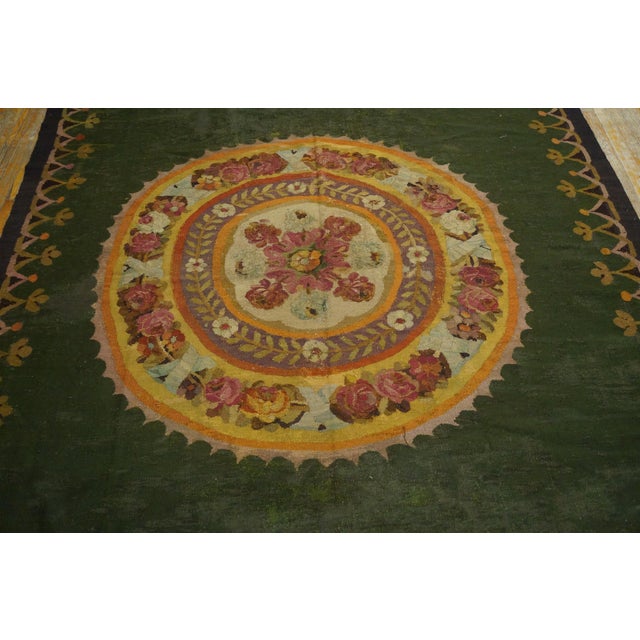 Antique French Floral Medallion Flat Weave Rug, Country of Origin: France, Circa Date: 1825. This exquisite example of...