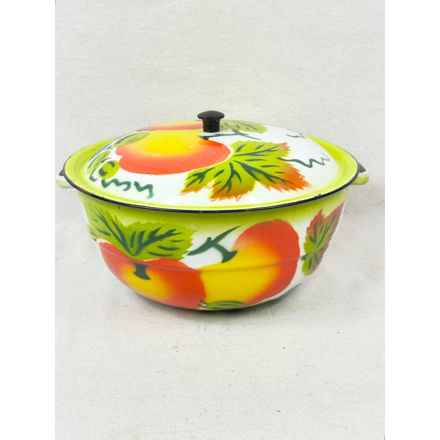 Large colorful vintage mid-century enamelware fruit-patterned serving bowl with a lid, commonly referred to by collectors...