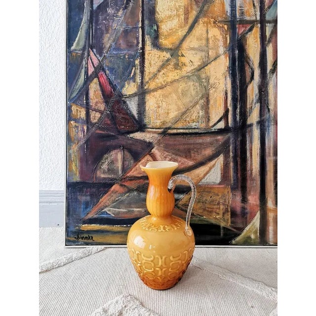 This large opalino vase was designed and manufactured in Italy in the 1960s. It consists of opalin incMicito blown glass...