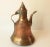 This hand-hammered dallah, or coffee kettle, has timeworn character from its genuine patina of age & use.