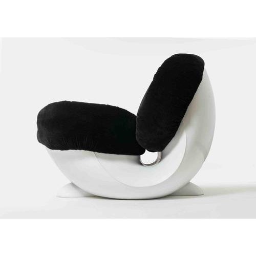 A rare and highly distinctive “Basculante” rocking lounge chair in fiberglass structure and velvet upholstery. designed by...