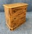 This diminutive 1960s three-drawer chest is crafted from solid elm wood and showcases exceptionally striking, almost...