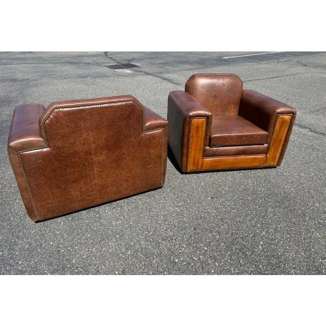 This pair of restored European Art Deco club chairs embodies strength, style, and sophistication. Fully restored from the...