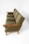A well, and solidly, made Danish mid-century modern sofa. The piece is constructed of carved / figured oak with paddle...
