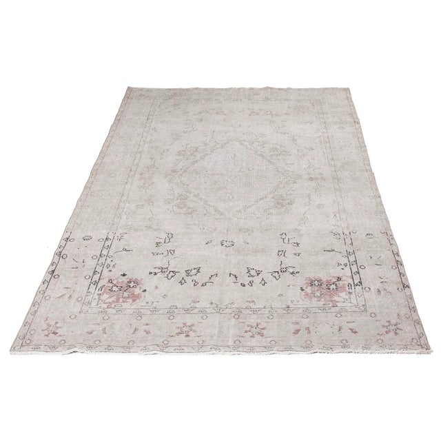 Vintage hand-knotted rug from Oushak region of Turkey. Approximately 50-60 years old. In very good condition.