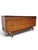 An elegant British mid-century sideboard by Harris Lebus for Harrods, dating from the 1950s. Beautifully crafted from burr...